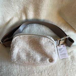 NWT Lululemon ivory sherpa belt bag